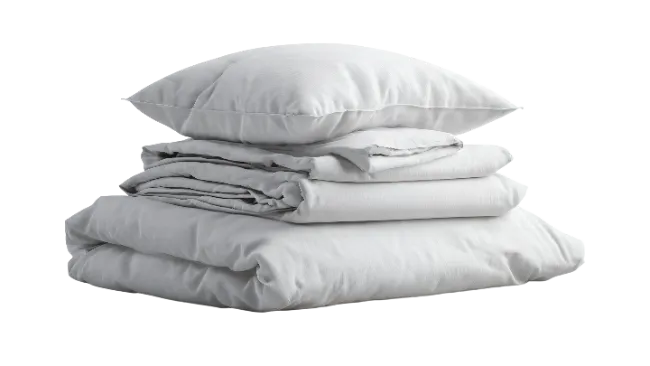 Stacked White Bedding and Pillow