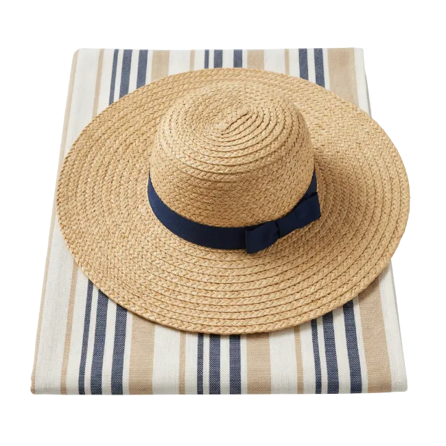 Straw Hat on Striped Beach Towel