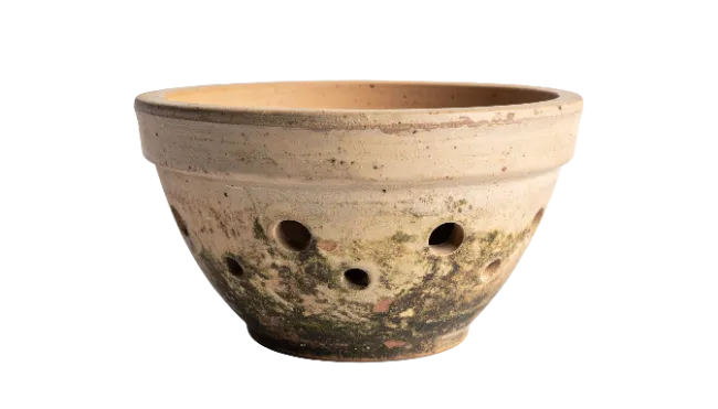 Terracotta bulb planter with drainage holes