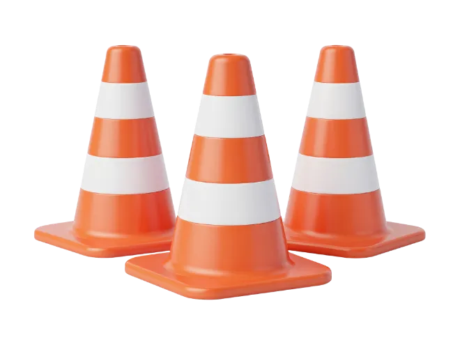 Three Orange and White Traffic Cones