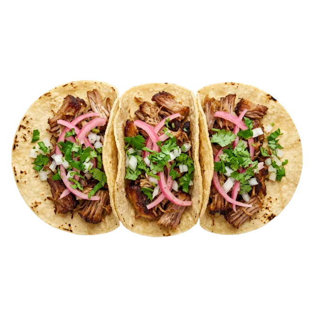 Three Pork Tacos With Cilantro and Onions
