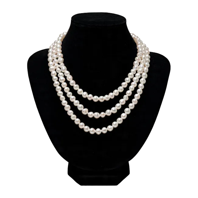 Triple Strand White Pearl Necklace on Black Bust