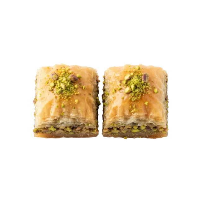 Two pistachio baklava pastries isolated
