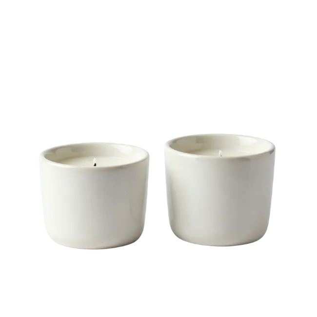 Two White Ceramic Jar Candles