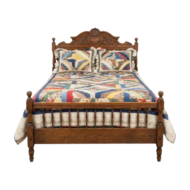 Vintage Wooden Bed with Patchwork Quilt